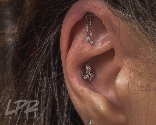 Conch Piercing Guide: Pain, Healing & Aftercare